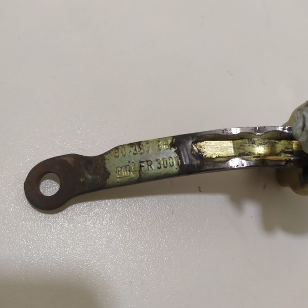 Limitador Porta Dianteira Esq Gm Corsa 2p